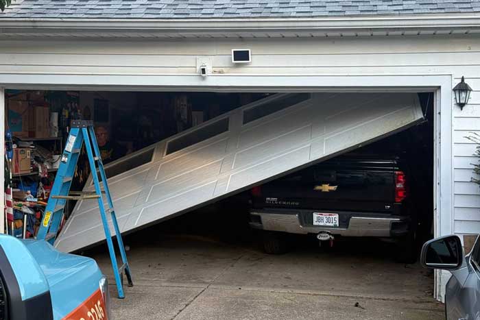 Ohio Garage Door Repair fixing garage door off-track near Garfield Heights, OH