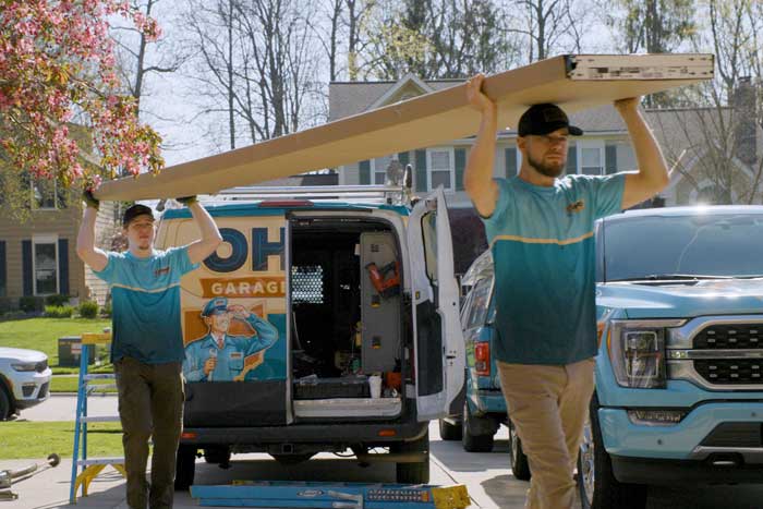 Ohio Garage Door Repair technicians installing a new garage door in Youngstown, OH