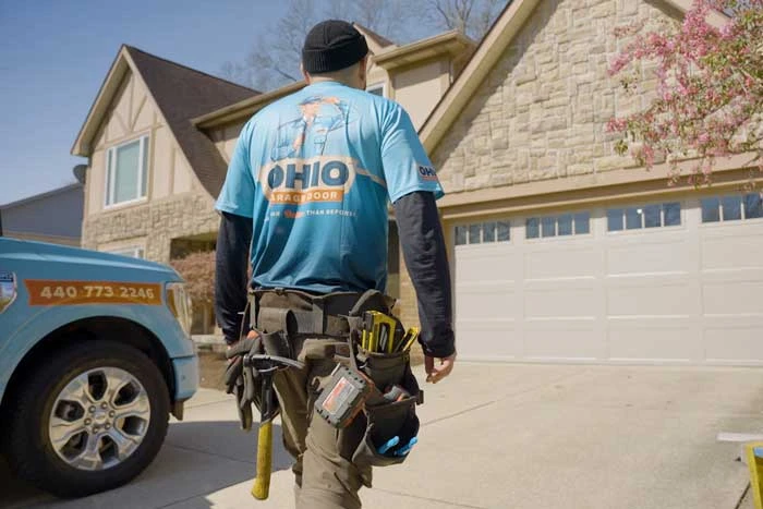 Ohio Garage Door Repair technician working on a garage door during an Eastlake-area service call