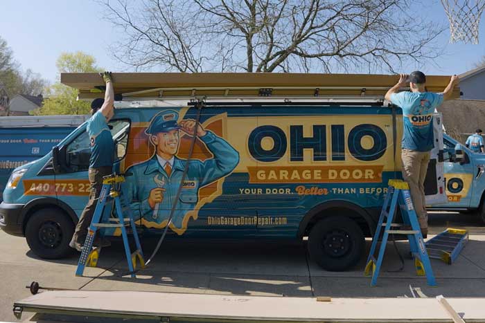 A Trusted Garage Door Repair Near Mentor, OH The Ohio Garage Door Repair technician unloading a work truck in Mentor